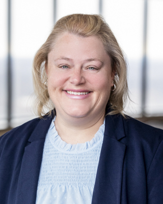 Headshot of Sarah K. Scheidker