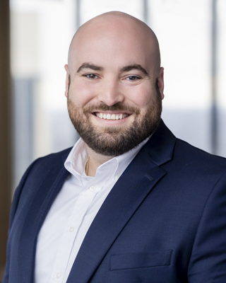 Headshot of J.T. Miller, CFA
